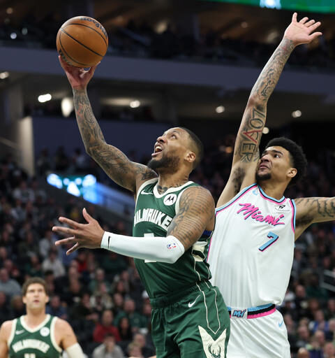 Bucks Blows Past Heat 125-96 Behind Lilliard’s Triple-Double