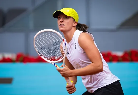 Swiatek sees off Shnaider in a though test to reach Madrid quarter finals